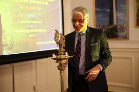 Ceremonial Lighting of Lamp by DCM Mr. Santosh Jha at the Event "Understanding Yoga and Culture: An Inaugural Programme" at the Embassy of India on February 16,2018.