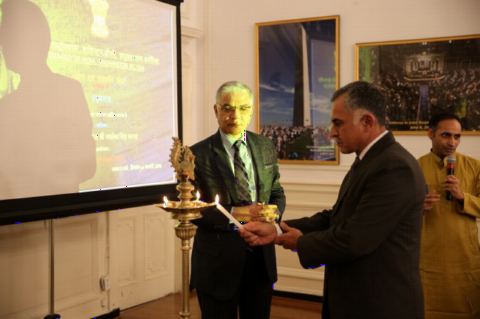 Ceremonial Lighting of Lamp by DCM Mr. Santosh Jha and Naval Attache Cmde. Sandeep Mehta at the Event "Understanding Yoga and Culture: An Inaugural Programme" at the Embassy of India on February 16,2018.