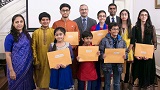 Winners of Hindi competitions with Amb Ms. Reenat Sandhu, Deputy Chief of Mission, and Shri NK Mishra, Minister (Community Affairs) at the Vishwa Hindi Diwas celebrations, hosted by the Embassy on January 27.