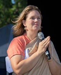 Ms. Carrie Trybulec, Director, Gandhi Memorial Center anchoring the 'First International Day of Yoga' event organized by the Embassy of India, Washington, DC in association with Friends of Yoga (FOY), at the National Mall in Washington, DC on June 21.