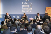 Dr. Arvind Subramanian having a Q&A Session. Also seen are Dr Adam Posen, President, Peterson Institute for International Economics and Mr Mukesh Aghi, President, USIBC.