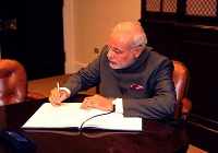 Prime Minister signing the visitor book, at the White House, in Washington DC on September 30, 2014.