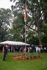 Unfurling of the National Flag by the Ambassador was followed by singing of the National Anthem by community members attending the Celebration.